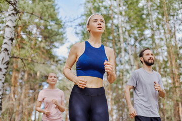 People exercising in the forest