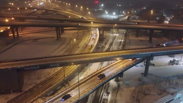 Aerial view of conditioned traffic in Highway viaducts due to snowstorm in Montréal, Nighttime