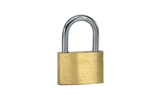 Brass pad lock isolated on the white background