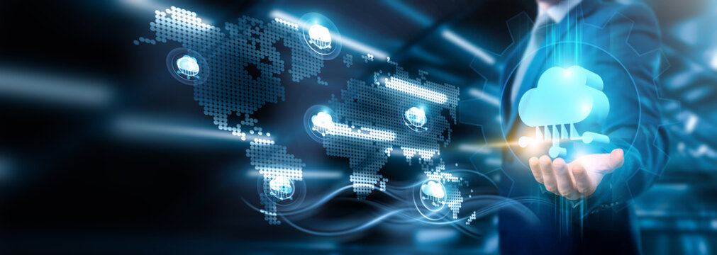Businessman holding cloud computing connections in cloud-based networking and cloud-driven data analytics, business strategy, cloud integration, cloud security solutions, technology, and global cloud.