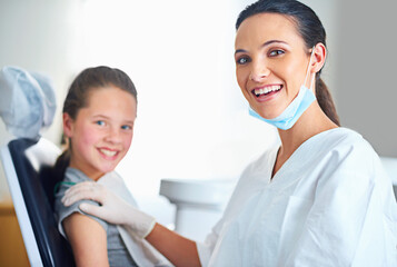 Consulting, clinic and portrait of dentist with child for cleaning, teeth whitening and wellness. Healthcare, dentistry and woman and girl with smile for dental hygiene, oral care and medical service