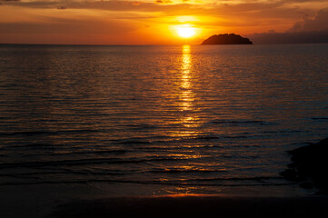 Beautiful sunset at Tanjung Aru Beach, Malaysia.