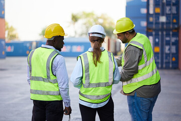 workers planing and talking about work or project in containers warehouse storage