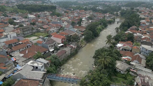 Suburban Bogor City Gets Split By The Flowing Cisadane River In West Java