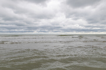 Baltic sea under cloudy sky in summer, closeup of photo
