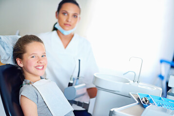 Dentist, clinic and portrait of child with smile for cleaning, teeth whitening and wellness. Healthcare, dentistry and woman and girl with tools for dental hygiene, oral care and medical services
