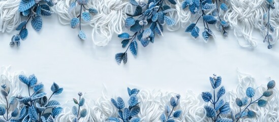 Knitted background with blue foliage and garland in angora yarn - obrazy, fototapety, plakaty
