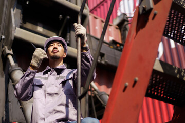 Logistic engineer working at the container yard.