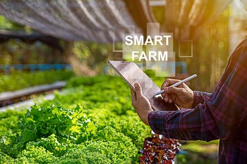 Smart farmer using application by smartphone concepts modern agricultural technology and visual...