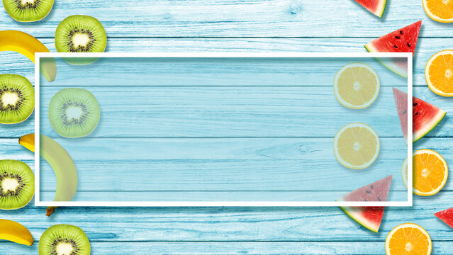 Fresh fruits on blue wooden table background. Summer Cooking Background. 