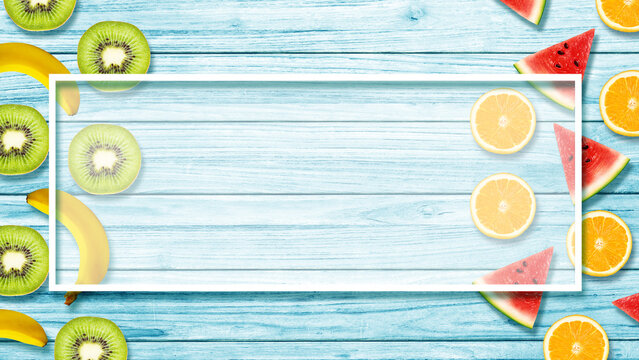 Fresh Blue Summer Cooking Background. Design Include Orange, Watermelon, Banana and Kiwi on Blue Wooden Table.