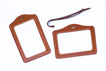 Brown leather label tag with string, isolated on the white