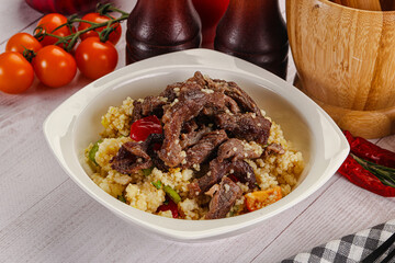 Traditional couscous with beef and vegetables