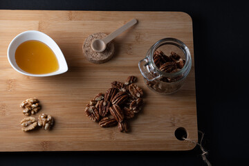 pecan nuts wooden background dark international pecan day 