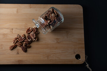 pecan nuts wooden background dark international pecan day 