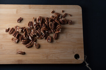 pecan nuts wooden background dark international pecan day 