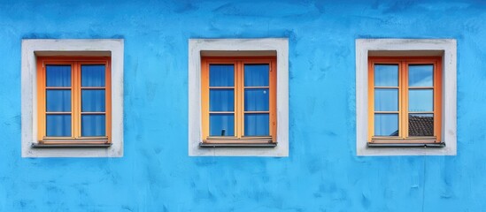 Fototapeta premium windows on a wall with blue background