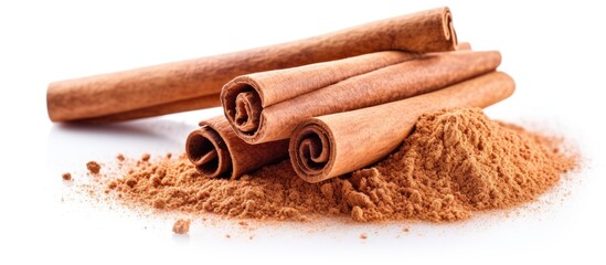 A pile of cinnamon sticks and powder, a staple ingredient in many cuisines and recipes, displayed on a white background