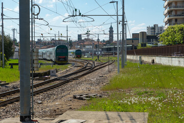 Varese city and train station, Italy, railway line. Skyline of the city of Varese and the train station along the Laveno - Milan route, Lombardy, north Italy. Panorama towards the city center
