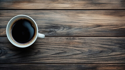 Black coffee cup on old wooden table top view black