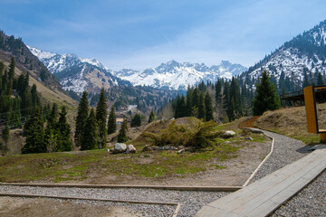 Mountain view in Almaty, Medeu. Hiking to the observation deck to cafe Apa Katya - obrazy, fototapety, plakaty