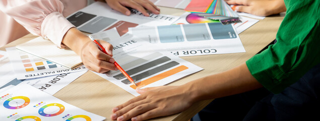 Cropped image of professional interior designers discuss and brainstorm main theme color in project...