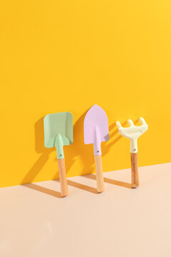 Colorful Gardening Tools on Yellow Background