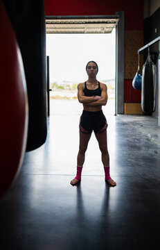 Fit woman standing in gym