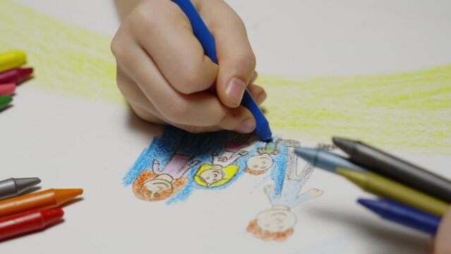 Children's hands draw a family  with a pencil close-up. Child Drawing House, Girl Coloring