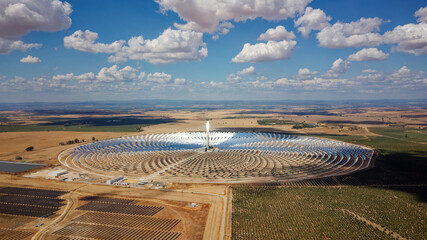 Aerial drone view of Gemasolar Thermosolar Plant. Solar energy. Green energy. Alternatives to...