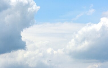 Naklejka na ściany i meble photo of a beautiful view of white clouds and blue sky