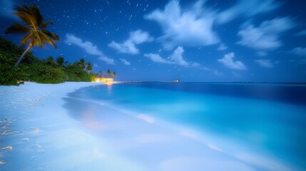 beautiful tropical beach at night with long exposure of the sky