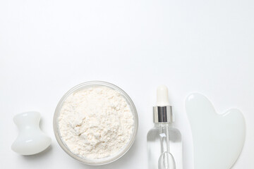 Collagen powder in a bowl on a light background