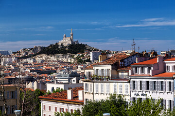 View of the city and the Cathedral of Notre Dame de la Garde on a sunny day. Marseilles. France.