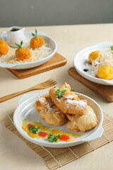 Katsu Curry and chesse on wood table