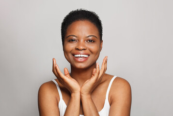 Cheerful female model face close-up. African American woman portrait. - 769475386