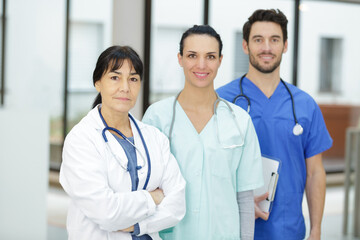 portrait of medical team looking at camera - 769478977