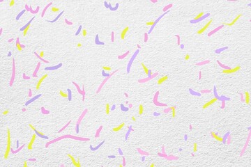 White Wall With Pink, Yellow, and Purple Paint Splattered
