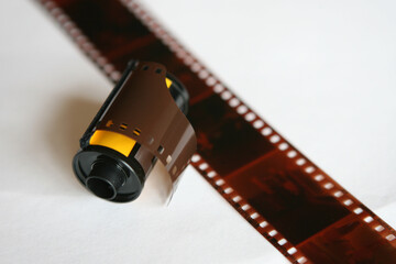 roll of vintage film negative on white background