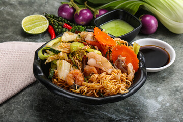 Asian cuisine - Fried noodles with seafood