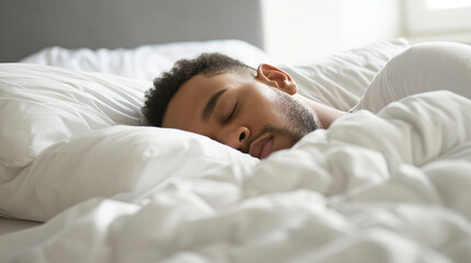 Afro-american man sleeping in bed