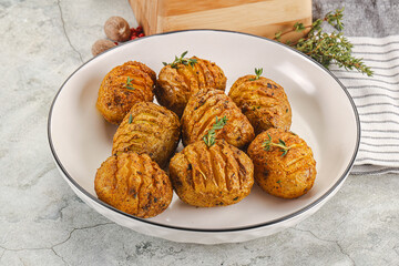 Baked baby potato with thyme