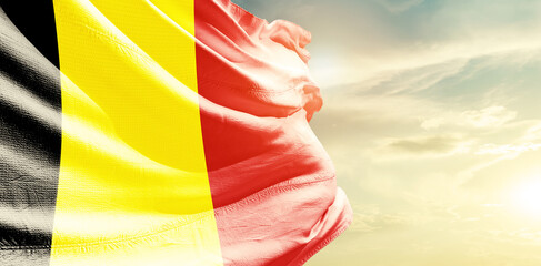 Belgium national flag waving in the sky. - obrazy, fototapety, plakaty