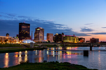 RiverScape view of Dayton, Ohio's skyline with new, exclusive Water Street Apartments along the Great Miami River  - obrazy, fototapety, plakaty
