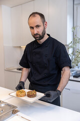Private chef preparing steak tartare at home - 769498195