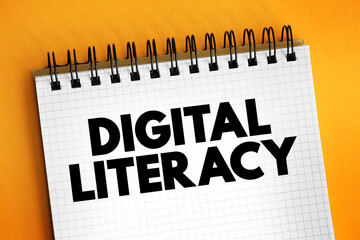 Digital Literacy - ability to find, evaluate, and communicate information by utilizing digital media platforms, text concept on notepad