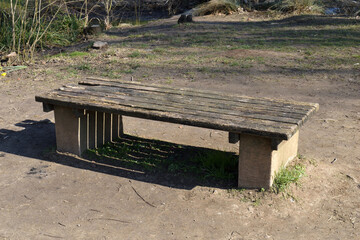 Close Up of Old Outdoor Wooden Bench in German Public Park 