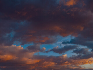 Naklejka na ściany i meble colorful and dramatic sunset clouds