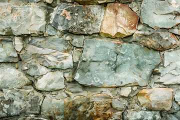 Close Up of Stone Wall Constructed With Rocks