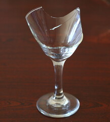 The remains of a broken glass goblet